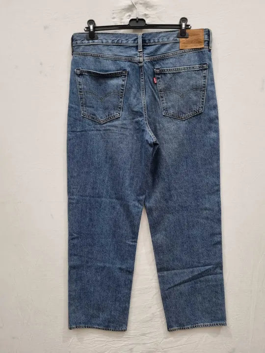Levi's Mid Blue High Waisted Tapered Mom Jeans Size: 36X32