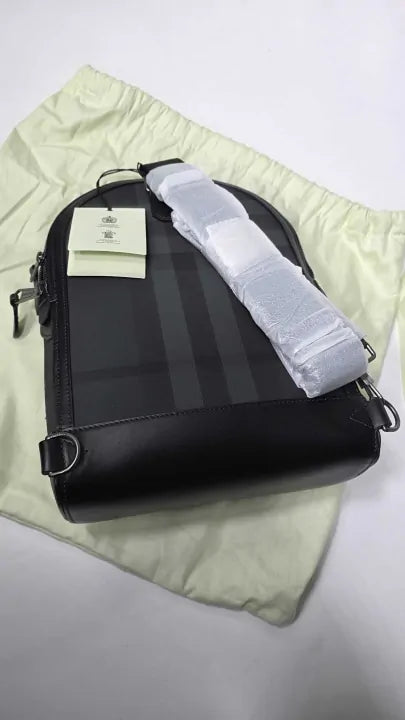 Burberry - Black Leather Small Check Burberry Backpack Size: *