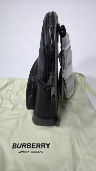 Burberry - Black Leather Small Check Burberry Backpack Size: *