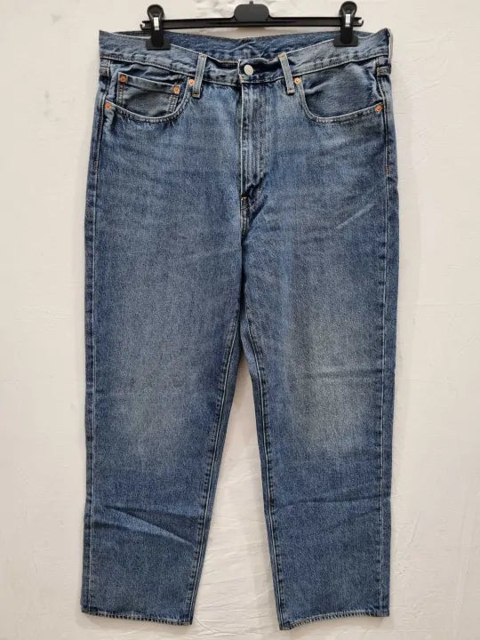 Levi's Mid Blue High Waisted Tapered Mom Jeans Size: 36X32