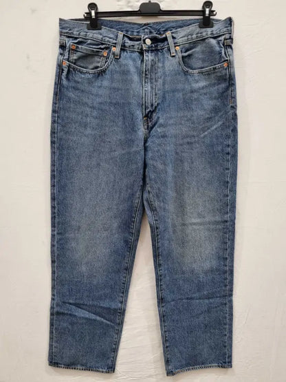 Levi's Mid Blue High Waisted Tapered Mom Jeans Size: 36X32
